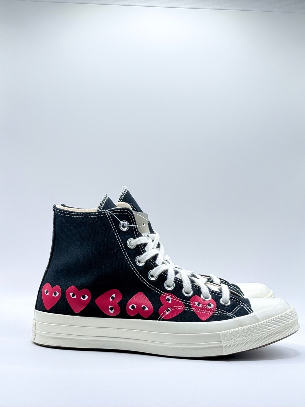 Converse Black High-Top Sneakers with Pink Heart Graphics